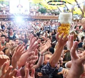 Bavarian Oktoberfest begins with the opening of the first beer barrel in Munich.