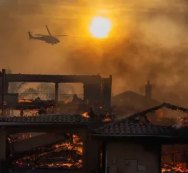 Dozens of houses destroyed by wildfire in California