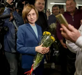 Pro-European President of Moldova Re-elected after Tense Race