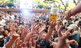 Bavarian Oktoberfest begins with the opening of the first beer barrel in Munich.