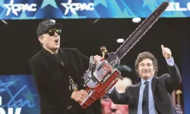 Elon Musk Performs Chainsaw Show on Stage