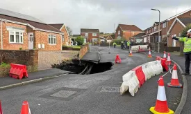 Giant Sinkhole Shocks Quiet Residential Area in Merthyr Tydfil, Wales