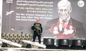 Hamas Hands Over Hostage Corpses in Black Coffins