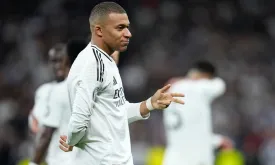 Mbappé Hat-Trick Sends Real Madrid to Champions League Round of 16