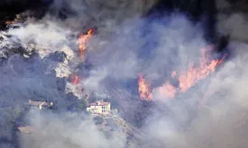 National Guard deployed to Los Angeles to prevent looting as death toll from fires rises to ten