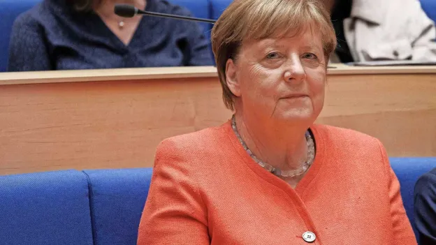 Angela Merkel expresses concerns about Donald Trump and Elon Musk but no regrets about her policies