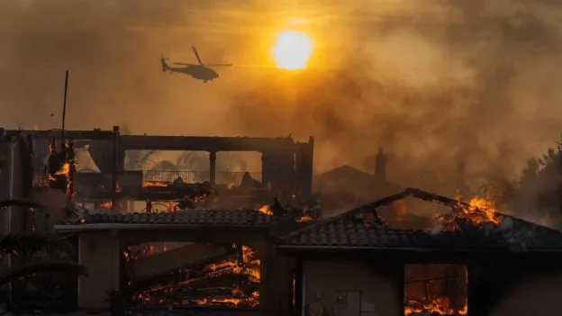 Dozens of houses destroyed by wildfire in California