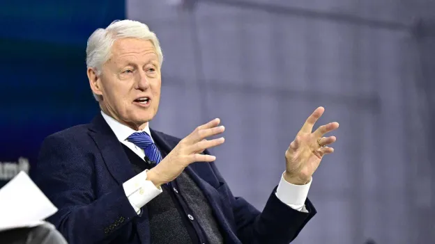 Former President Bill Clinton hospitalized with fever