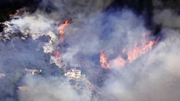 National Guard deployed to Los Angeles to prevent looting as death toll from fires rises to ten