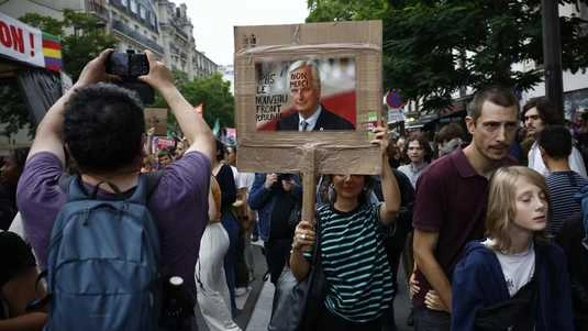 New French government presented, protests reported in major cities