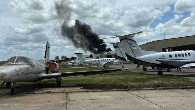 Private Jet Crashes into Building at Airport in Argentina and Catches Fire