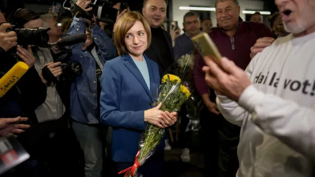 Pro-European President of Moldova Re-elected after Tense Race